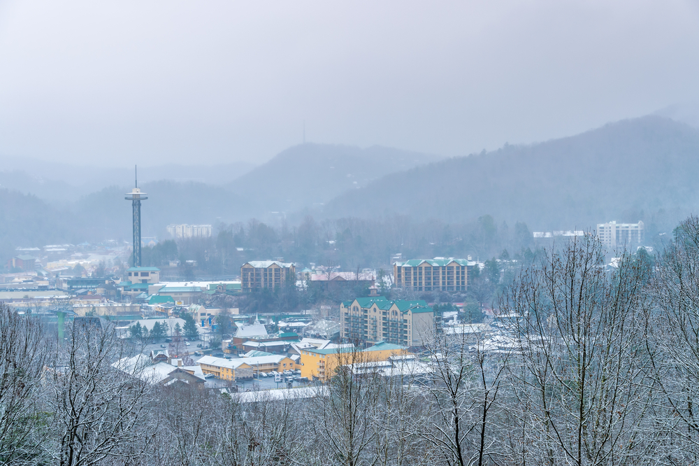 view of downtown Gatlinburg in winter covered in snow